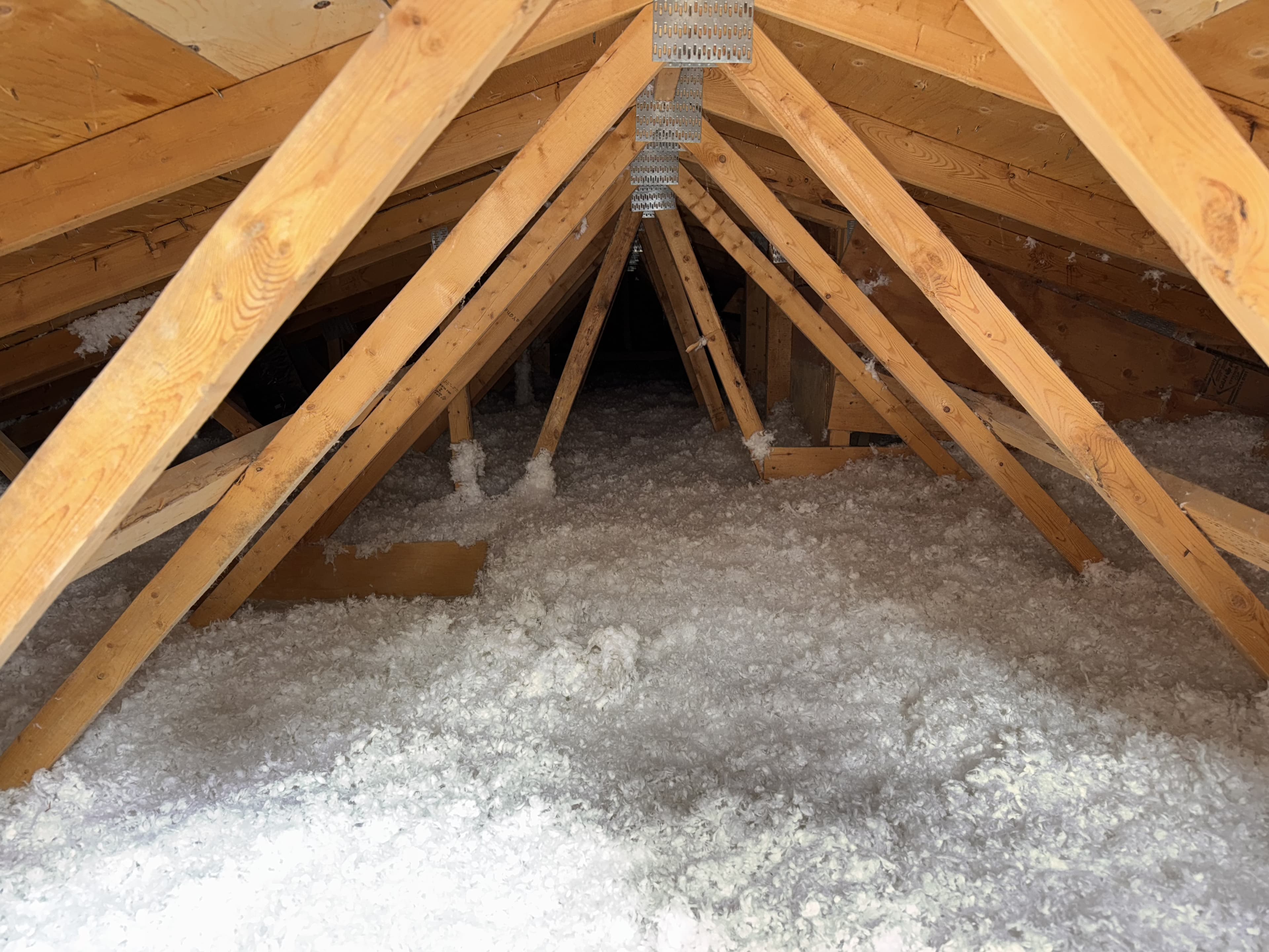 Attic insulation installed in a Toronto home